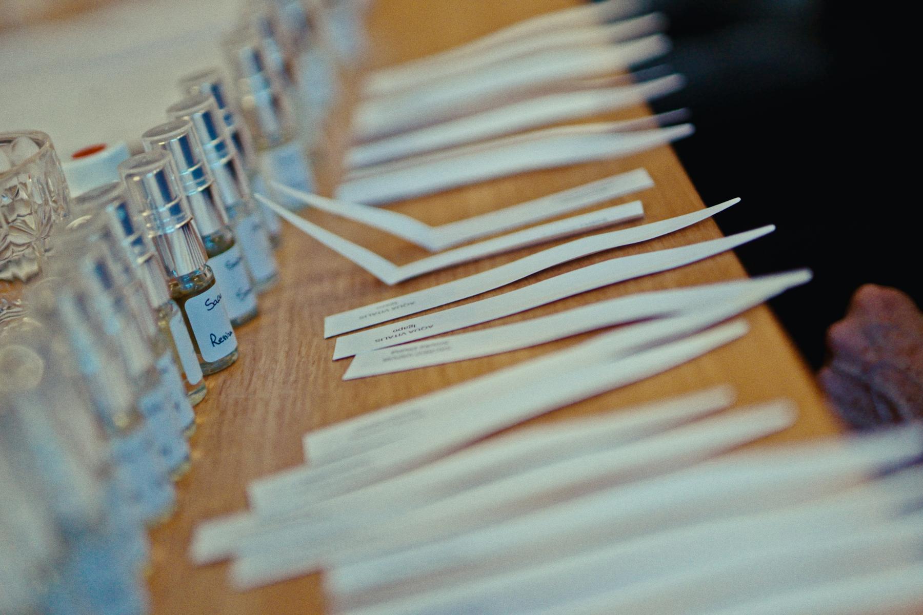 Perfumer's blotters and vials during a Living Scents evaluation session